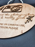 Photographer sign